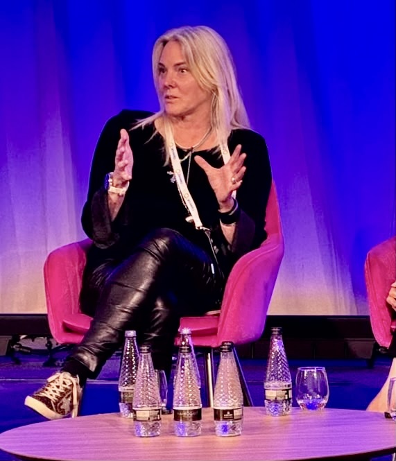 Juliette Denny speaking on a conference panel